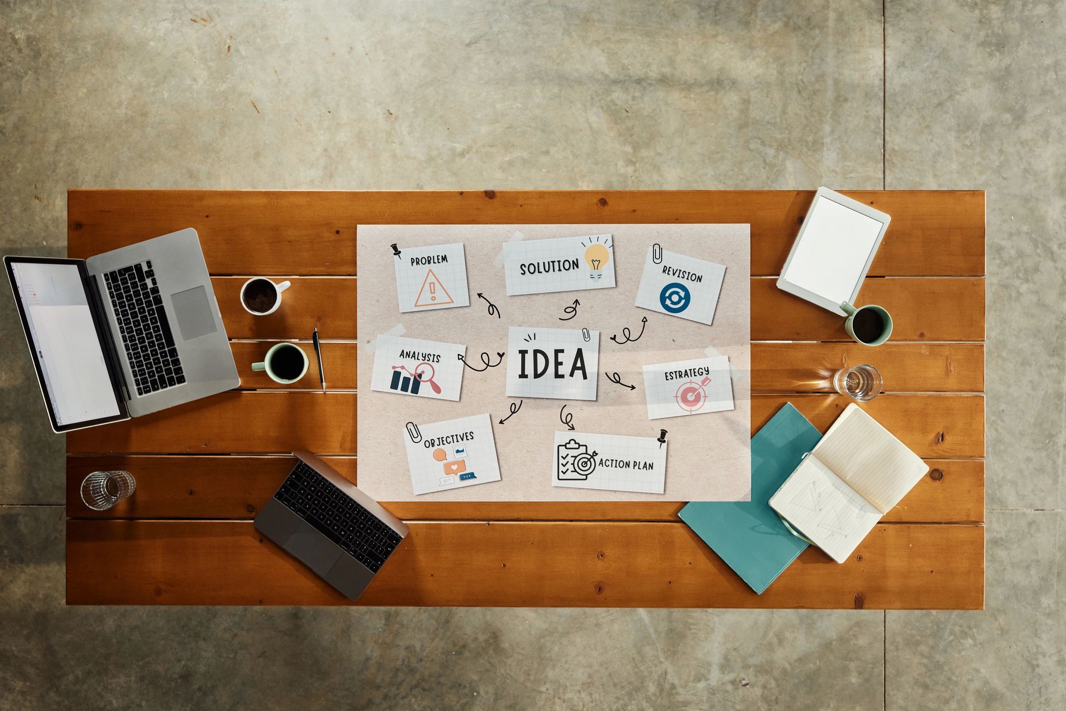 Brand strategy workspace with creative materials on a desk